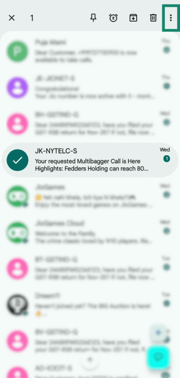 Messages app on Android, with the three-dot menu at the top highlighted.