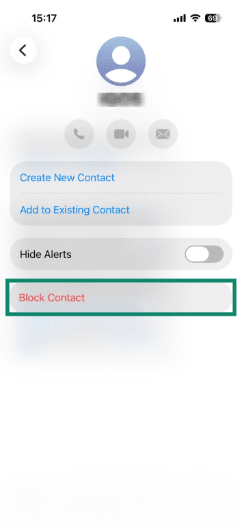 'Block Contact' option highlighted in the contact's profile page in the Messages app of an iPhone.