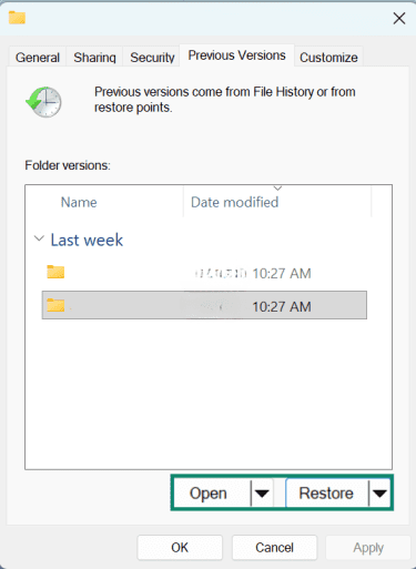 An example of the Restore previous versions window with the Open and Restore options highlighted.
