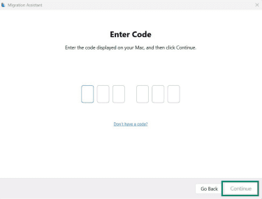 The Migration Assistant application on Windows, showing the option to enter a code to sync the Windows and macOS devices.
